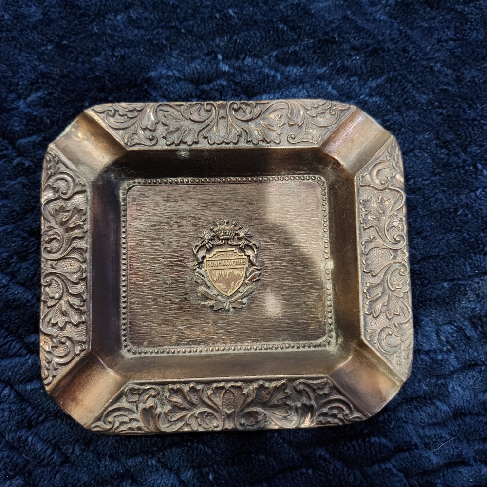 Vintage copper souvenir ashtray from Howe Caverns